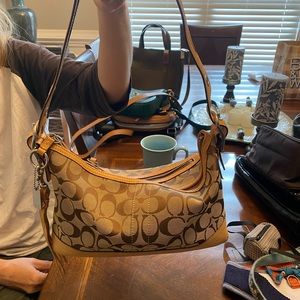 Coach signature bag.